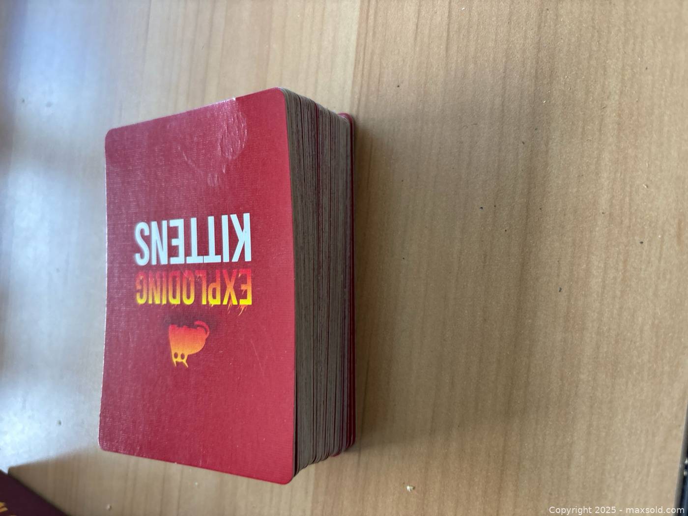 Exploding Kittens Original Edition Card Game | Maxsold