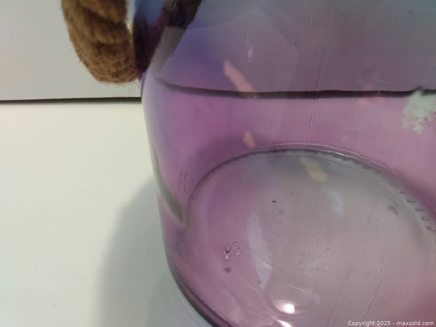 Iridescent Blue & Pink Glass Vase with Rope Handle | Maxsold