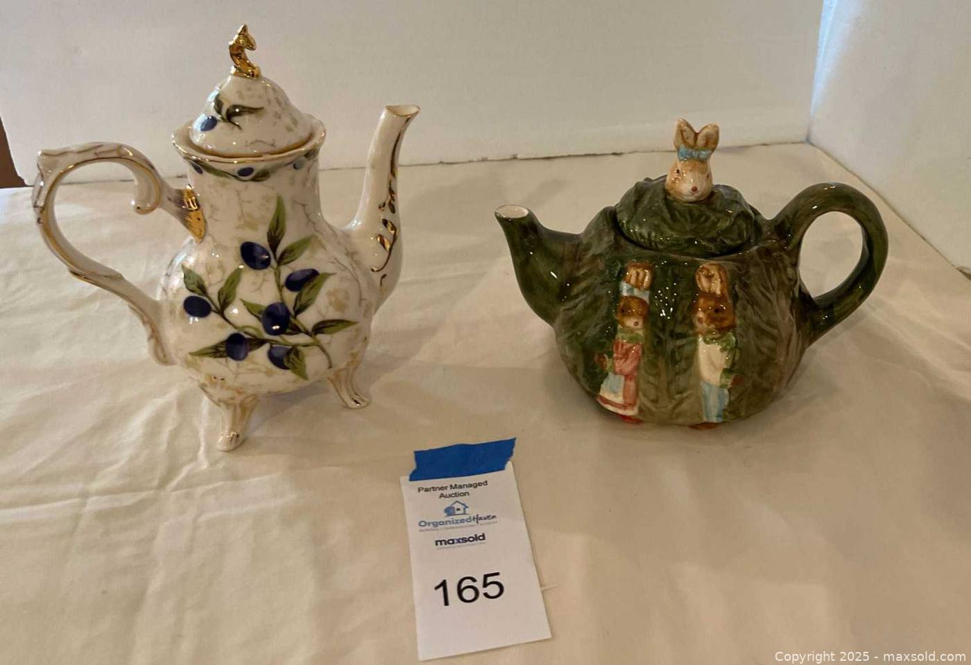 Decorative porcelain blueberry teapot and cabbage rabbit teapot | Maxsold