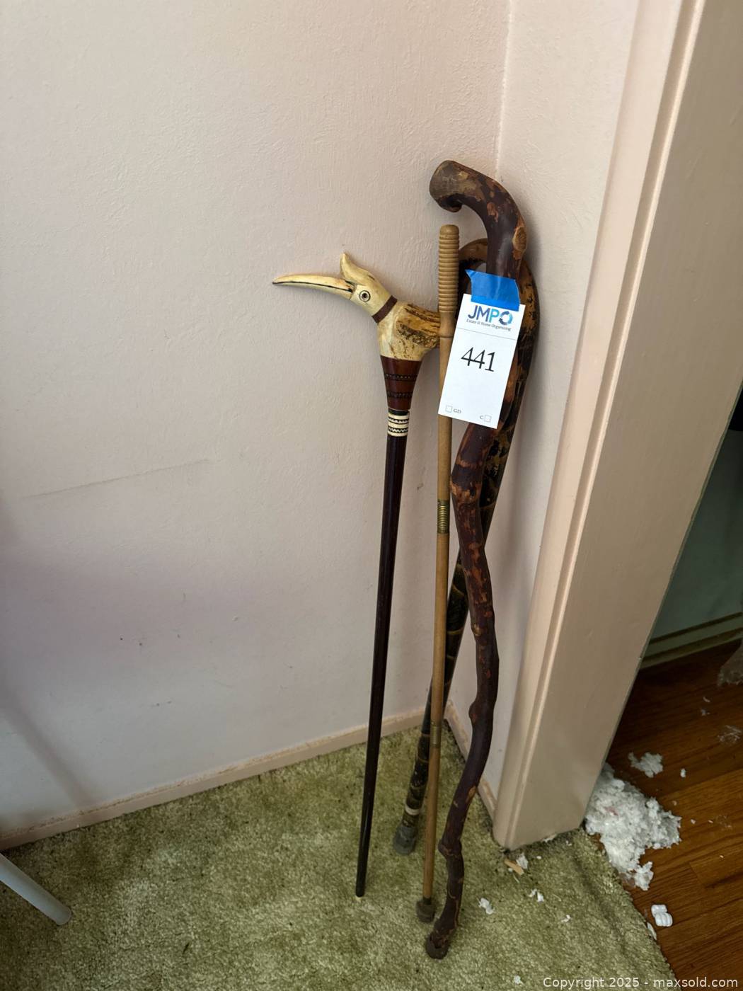 Four vintage carved and inlaid wood canes | Maxsold