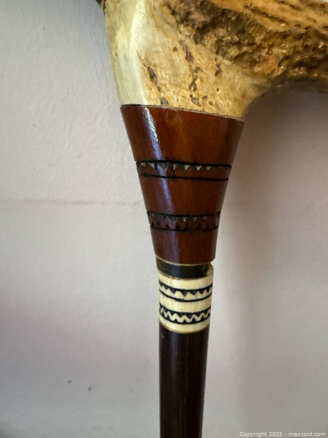 Four vintage carved and inlaid wood canes | Maxsold