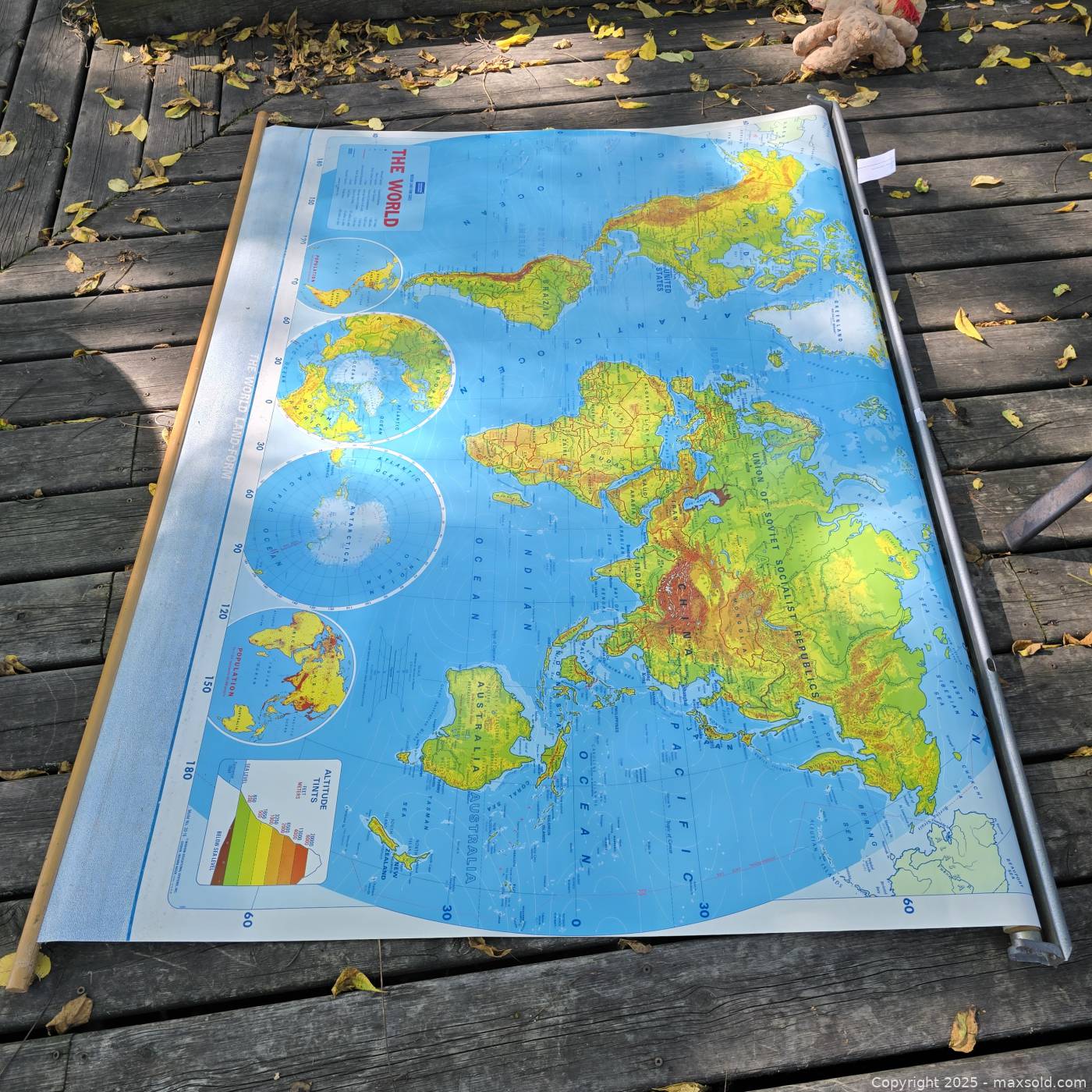 Vintage 1969 roll-down world classroom map | Maxsold