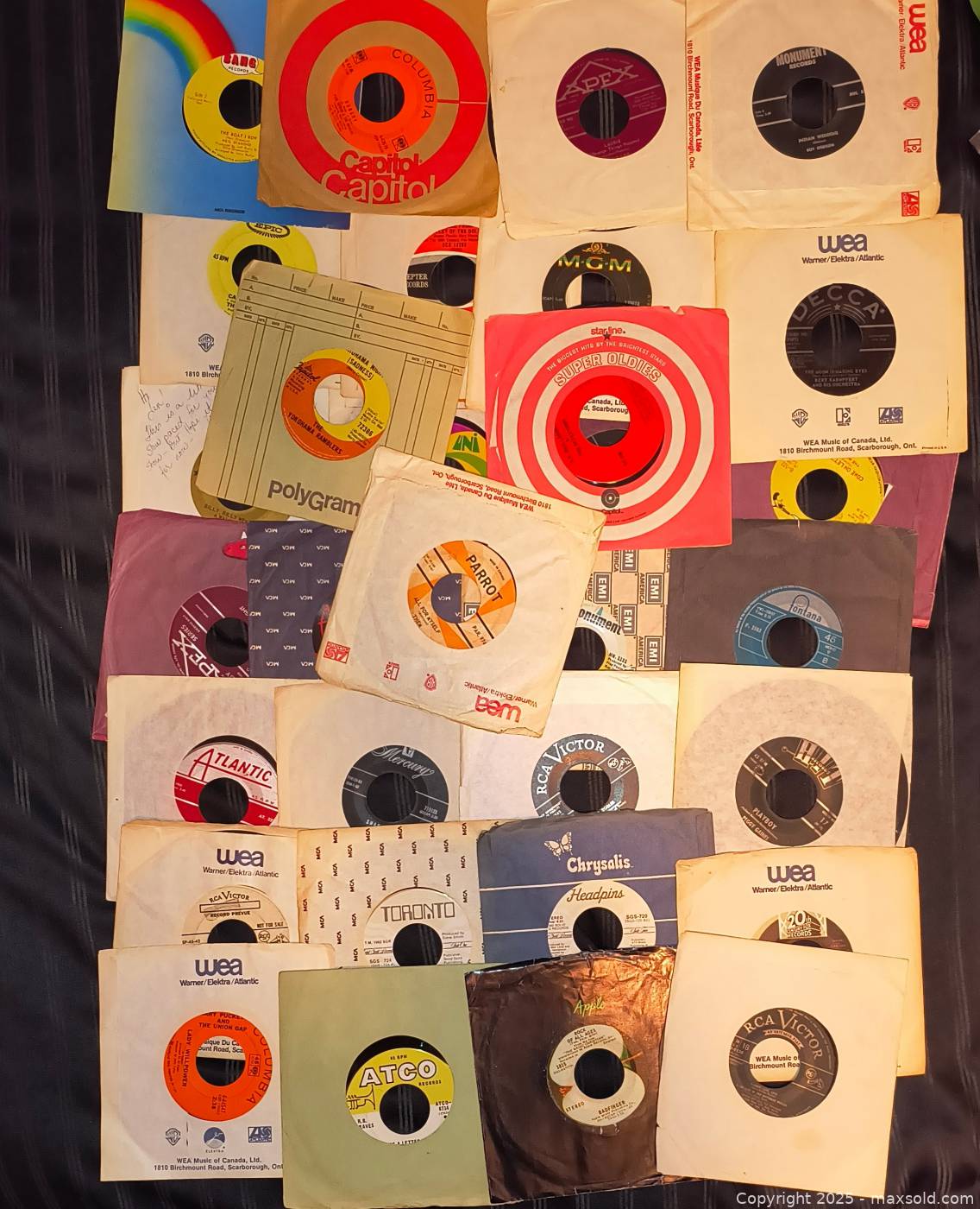 31 45 RPM vinyl records | Maxsold