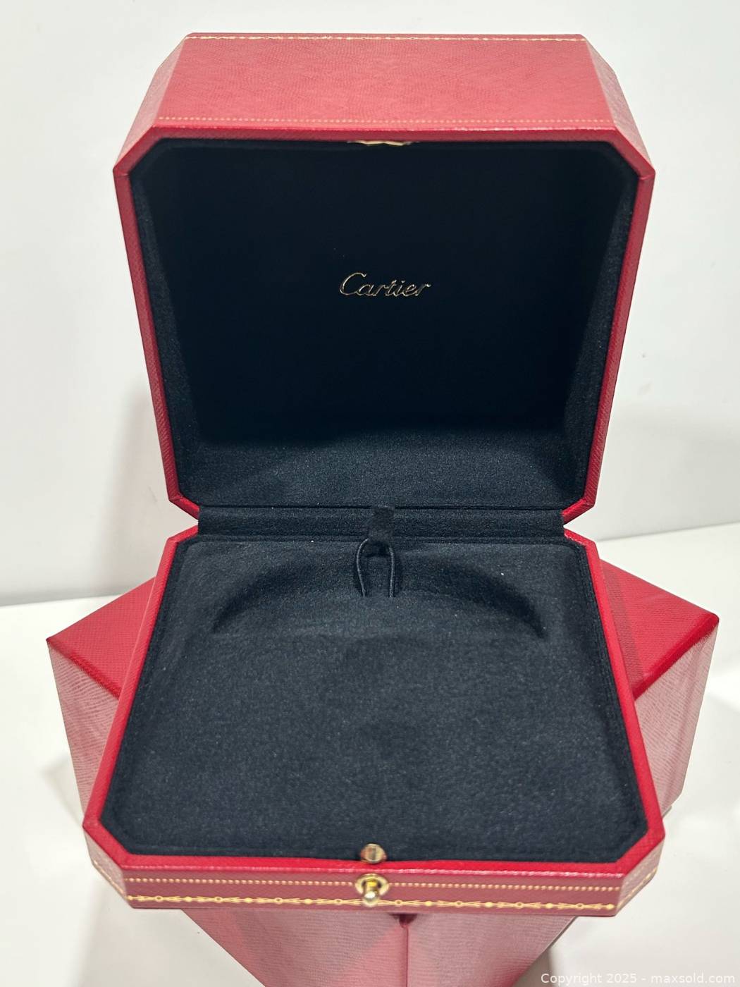 Cartier red jewellery boxes and sleeves | Maxsold