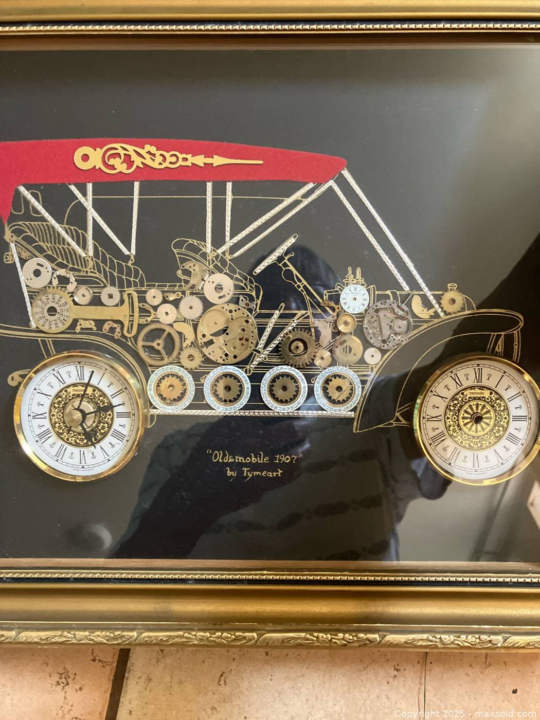 Tymeart “Oldsmobile 1907” framed clock art and circular wall clock ...