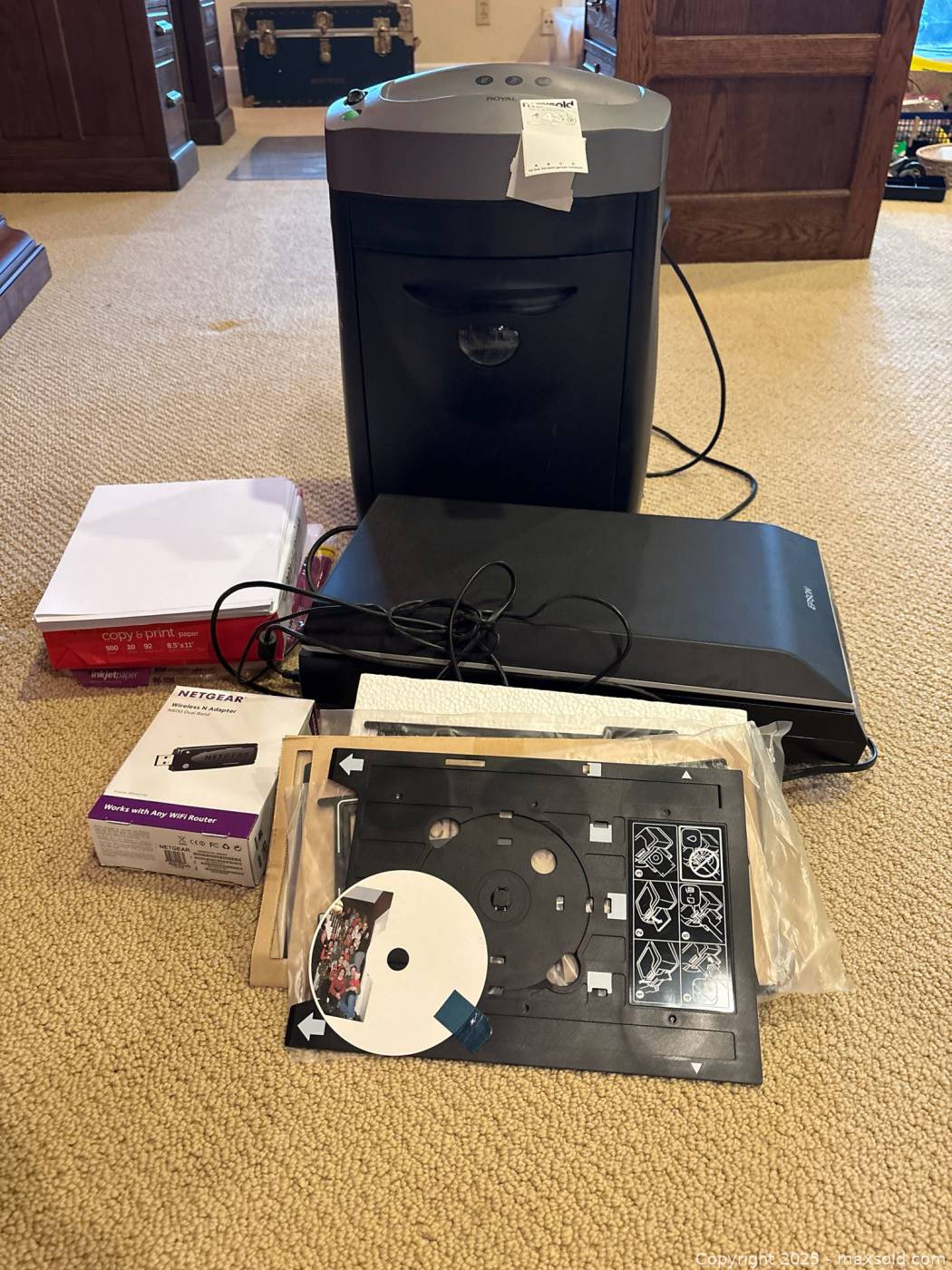Paper shredder, Dell scanner, NETGEAR USB adapter, copy paper | Maxsold