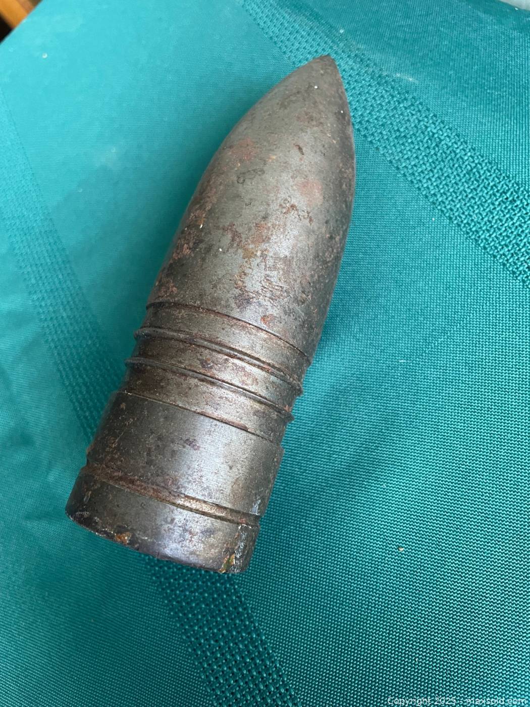 Antique metal artillery shell paperweight | Maxsold