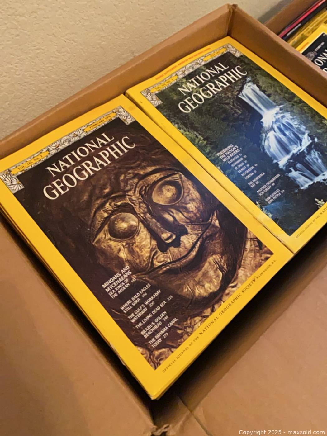 Over 200 National Geographic magazines and world globe | Maxsold