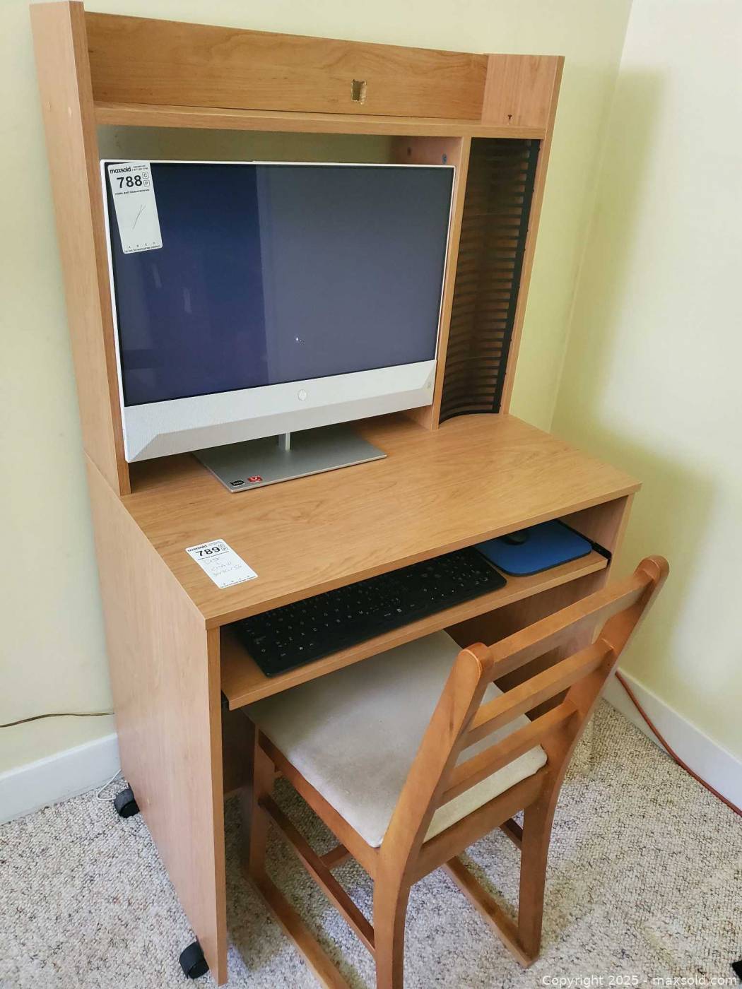 Compact computer desk on casters with side chair | Maxsold