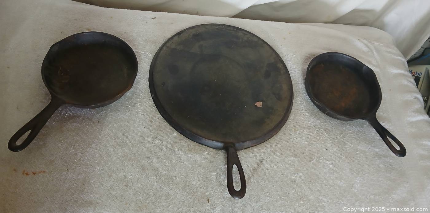 Cast iron griddle and two skillets | Maxsold