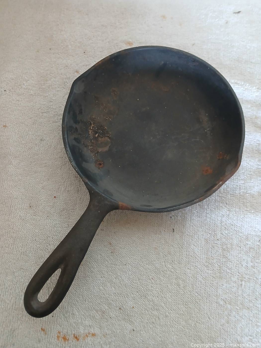 Cast iron griddle and two skillets | Maxsold