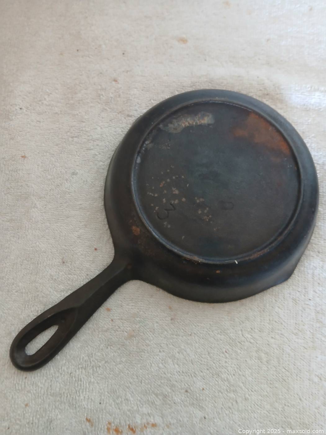 Cast iron griddle and two skillets | Maxsold