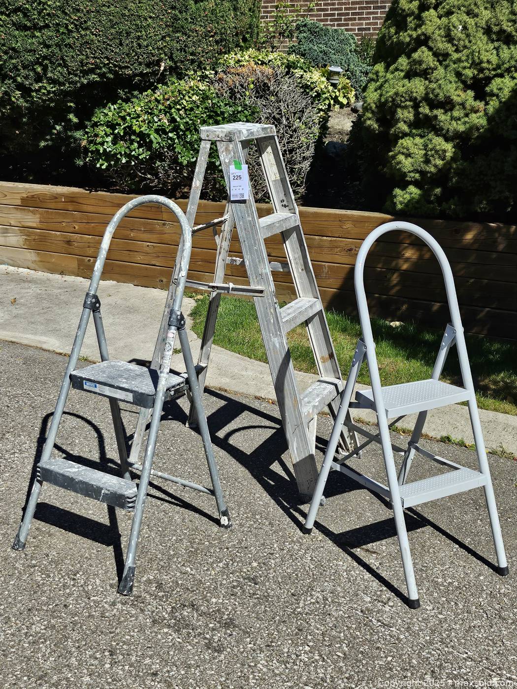 Re Ladder Three metal step ladders | Maxsold
