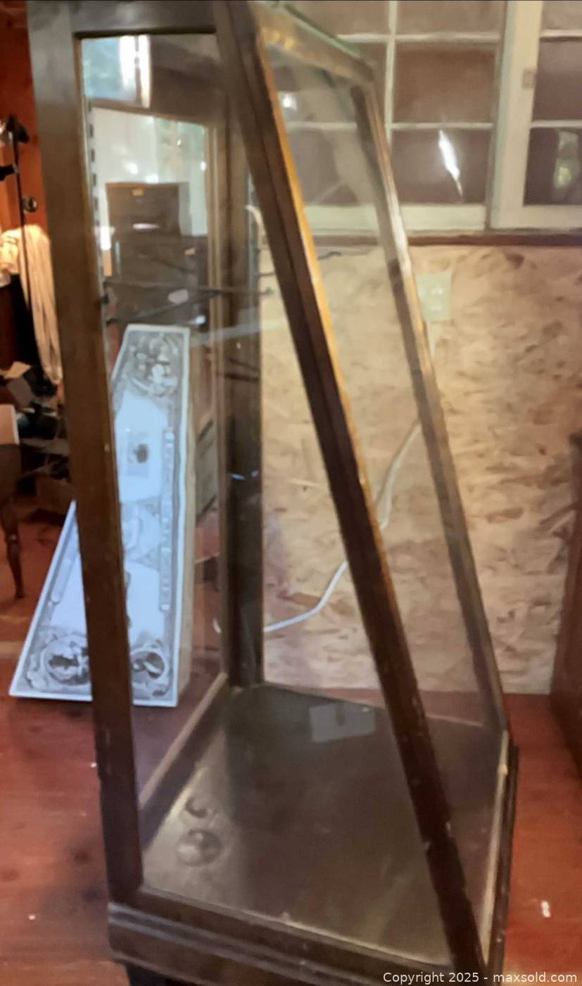 Antique wood and glass trapezoid display case, three cardboard banjo ...