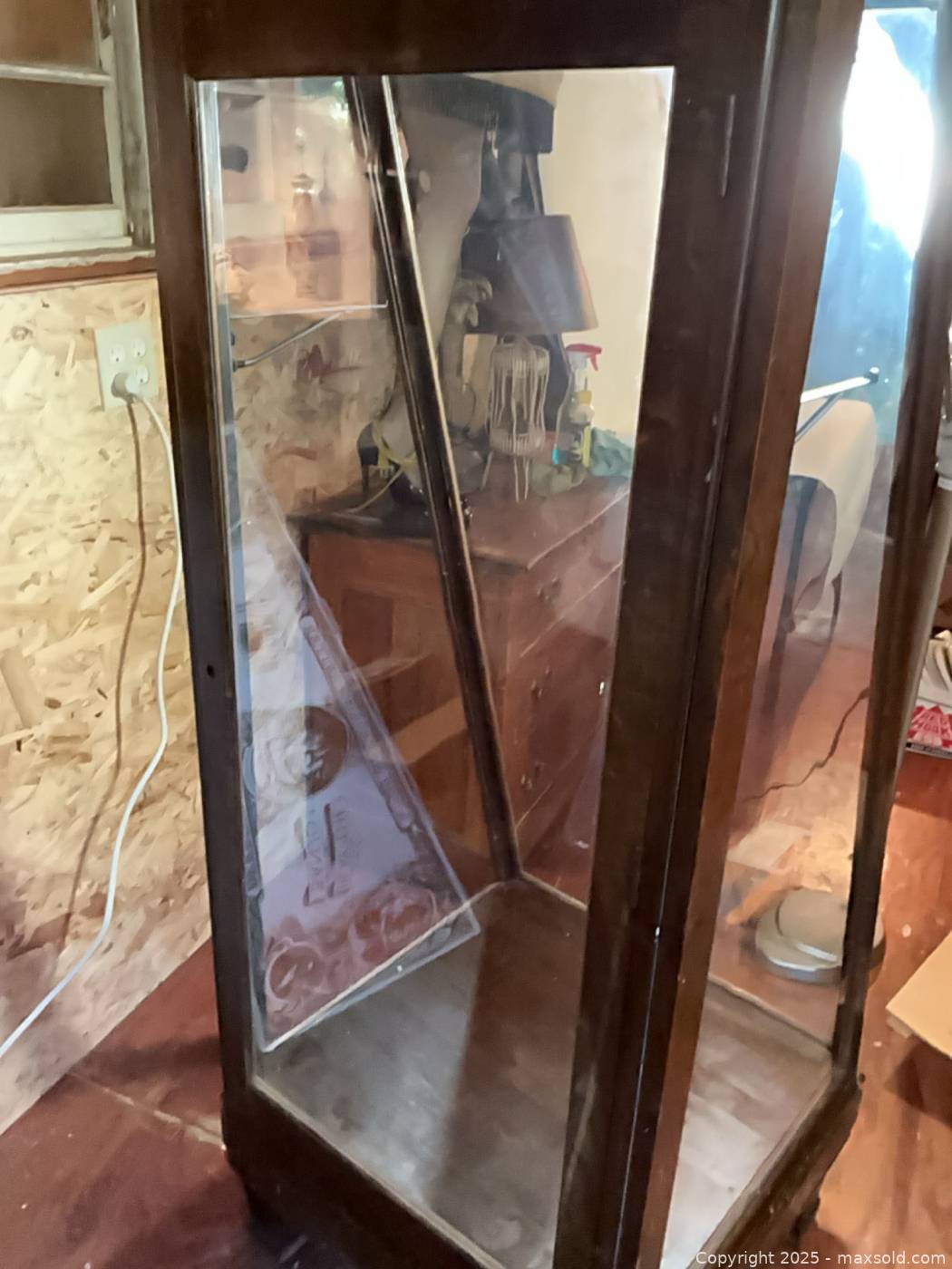 Antique wood and glass trapezoid display case, three cardboard banjo ...