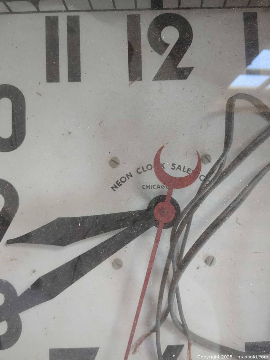 Metal Neon Clock Sales Co. wall clock | Maxsold