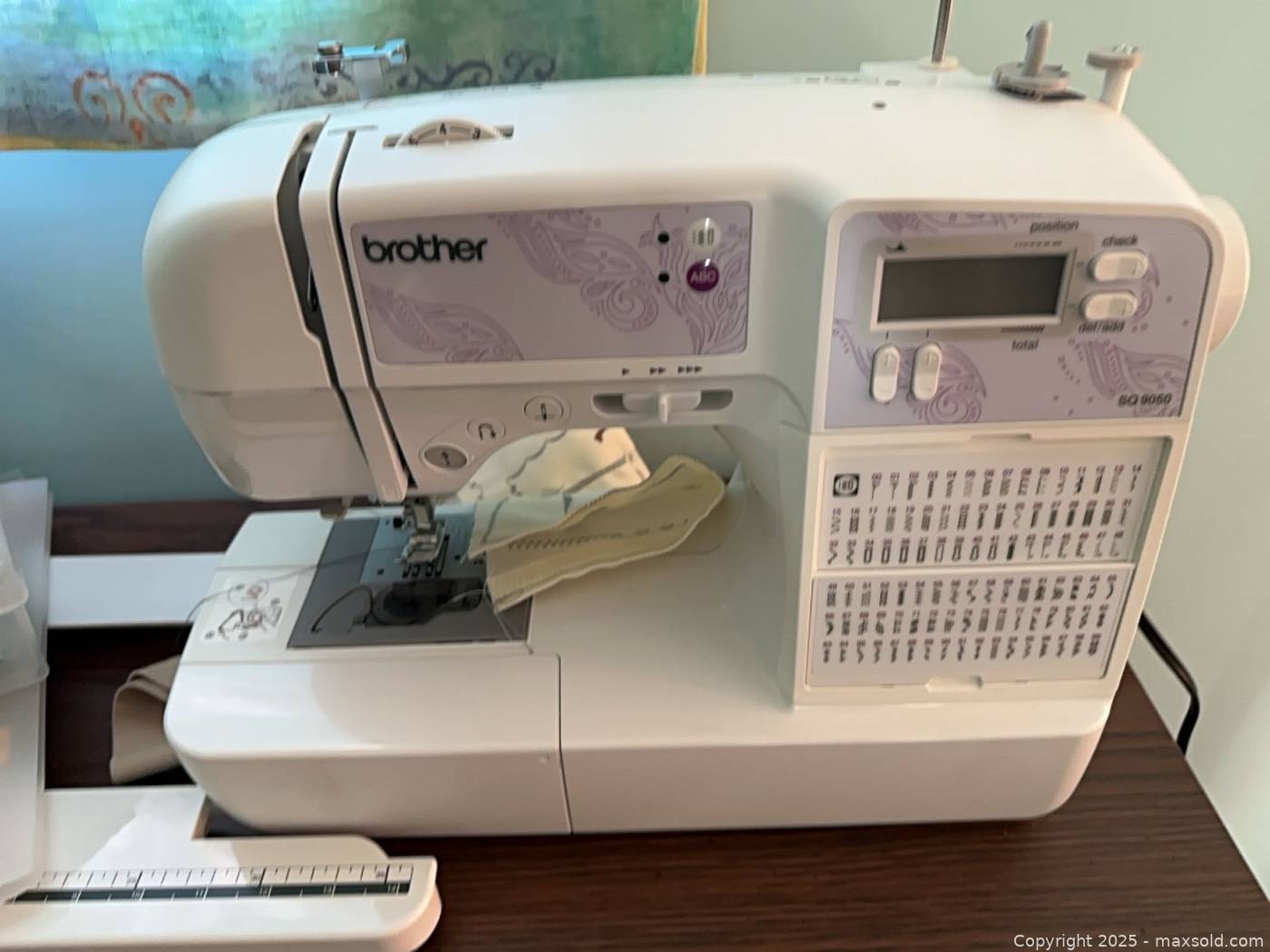 Brother SQ9050 sewing machine with cabinet | Maxsold