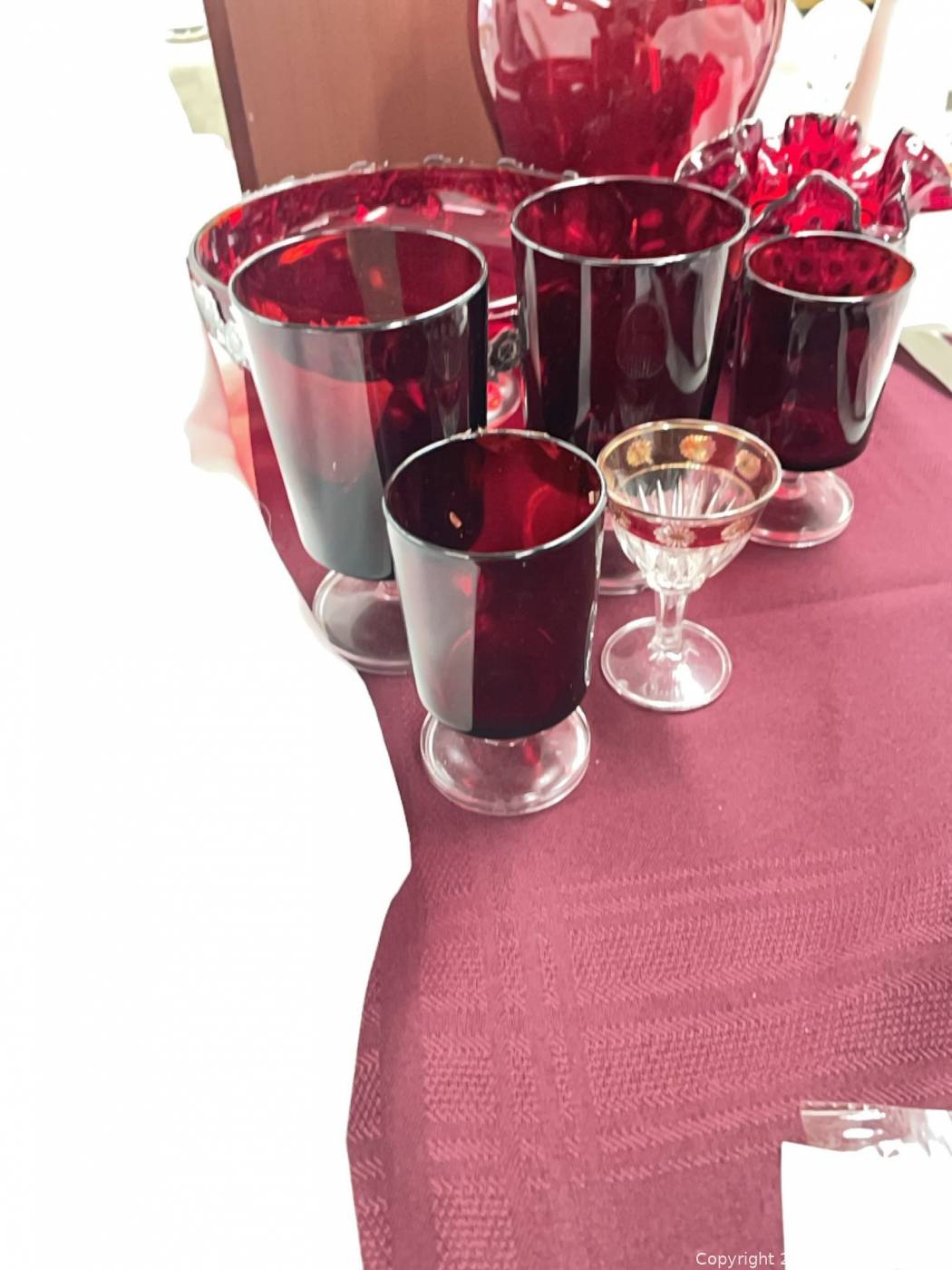 Ruby red glass footed compote with silver rose overlay | Maxsold