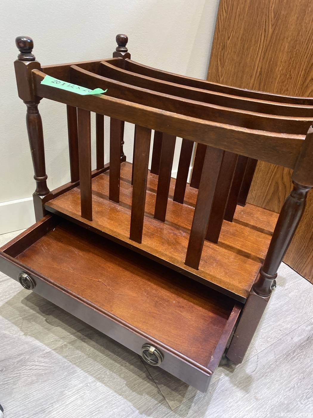 Upholstered Caster Chair And Bombay Magazine Rack | Maxsold