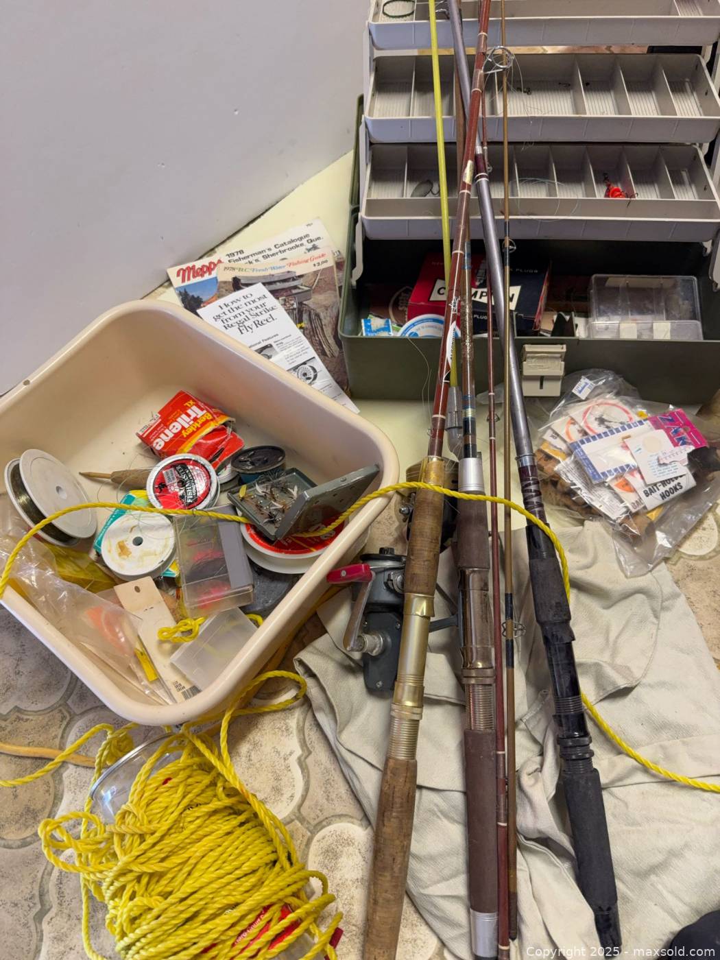 Mixed fishing rods, reels, tackle box, tackle | Maxsold