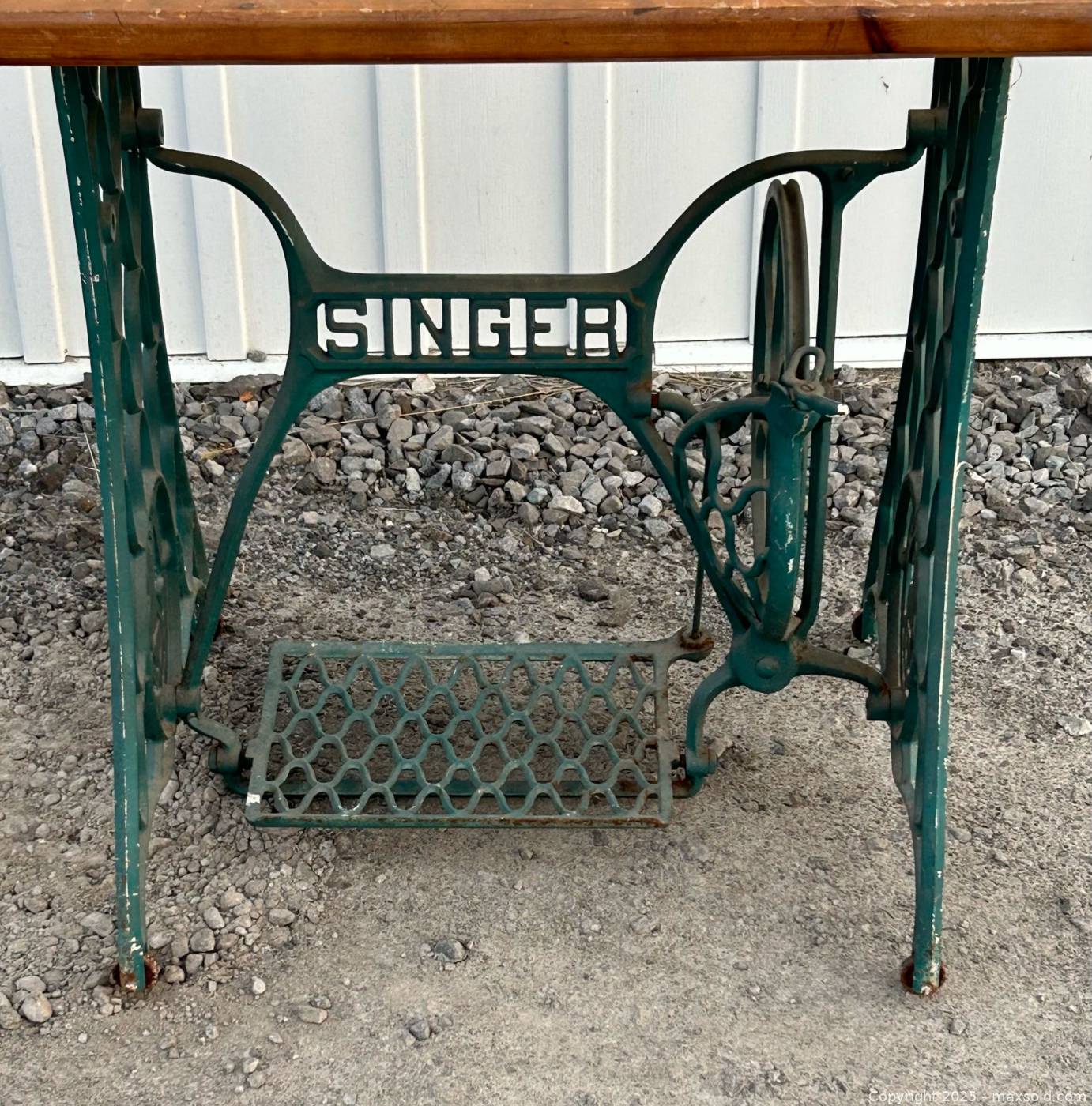 Singer Side Singer cast iron treadle base side table | Maxsold