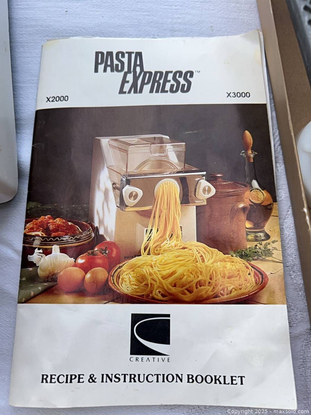 Pasta Express Raffles Creative Pasta Express automatic pasta maker with discs, bowls ...