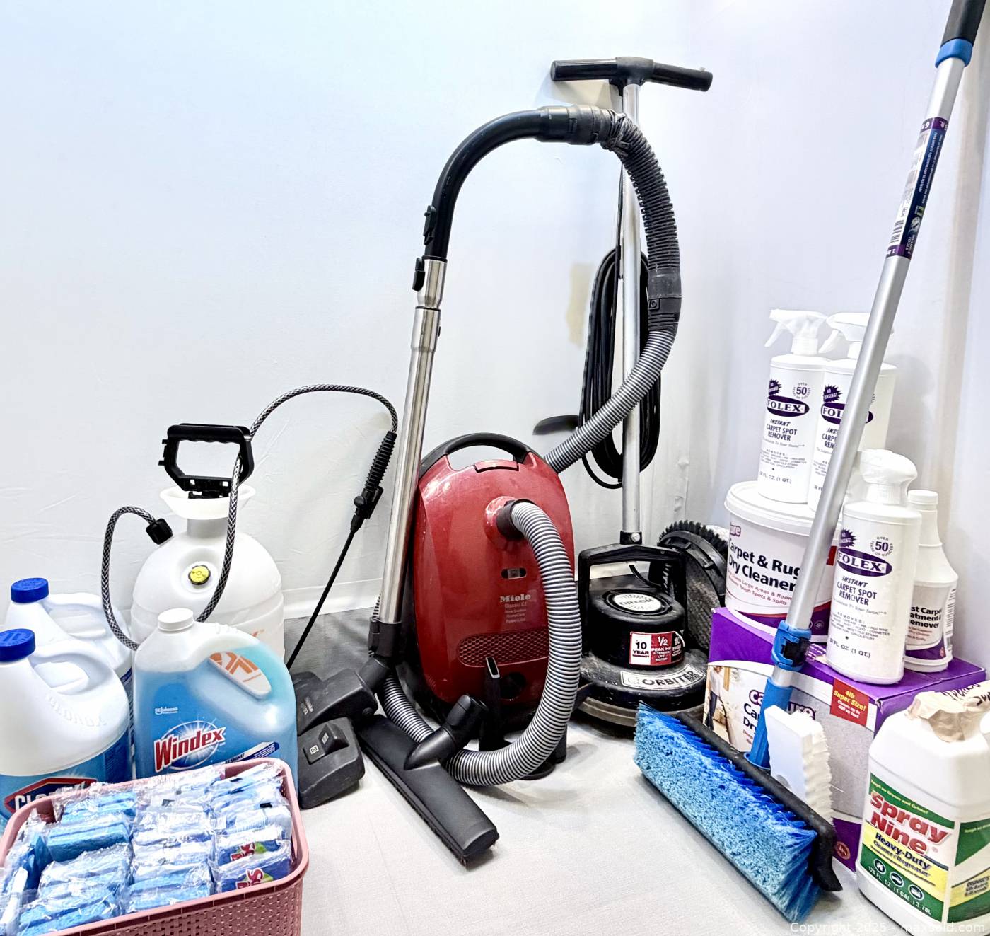 Miele Classic C1 vacuum, Oreck Orbiter and assorted cleaning chemicals
