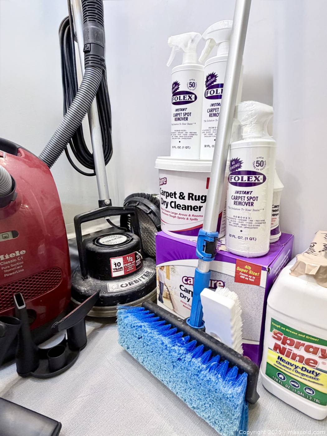 Miele Classic C1 vacuum, Oreck Orbiter and assorted cleaning chemicals