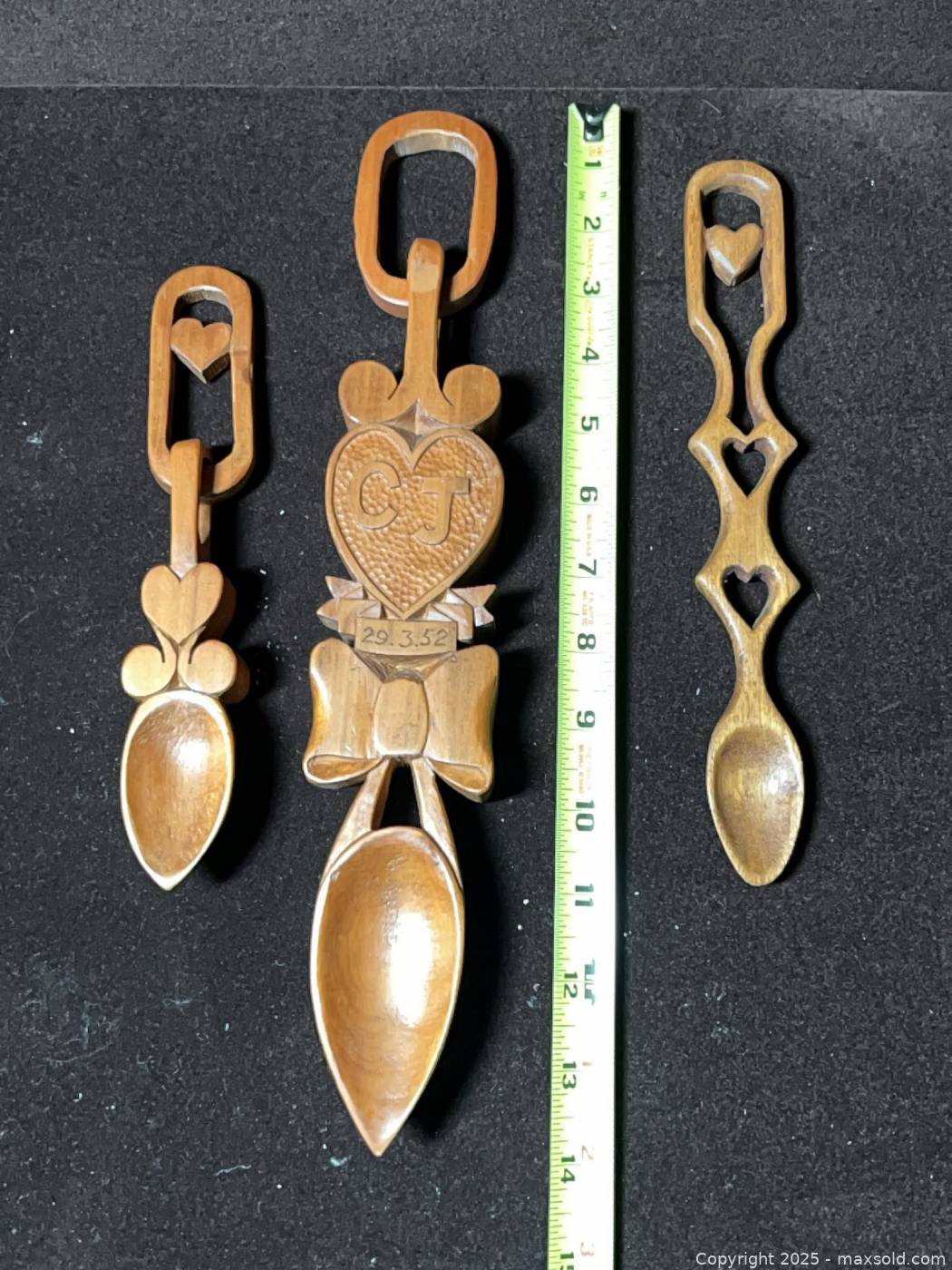 Vintage ceramic fish tile and 3 carved spoons | Maxsold