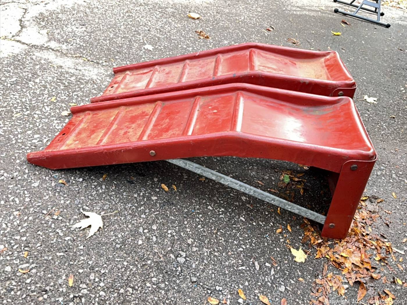 Red Car Ramp Pair of red metal vehicle service ramps | Maxsold