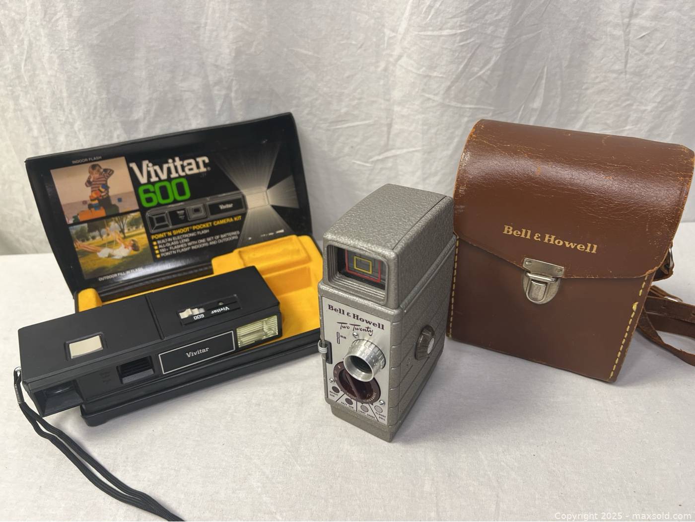 Bell & Howell Two Twenty 8mm Camera, Case, Vivitar 600 Camera Kit | Maxsold
