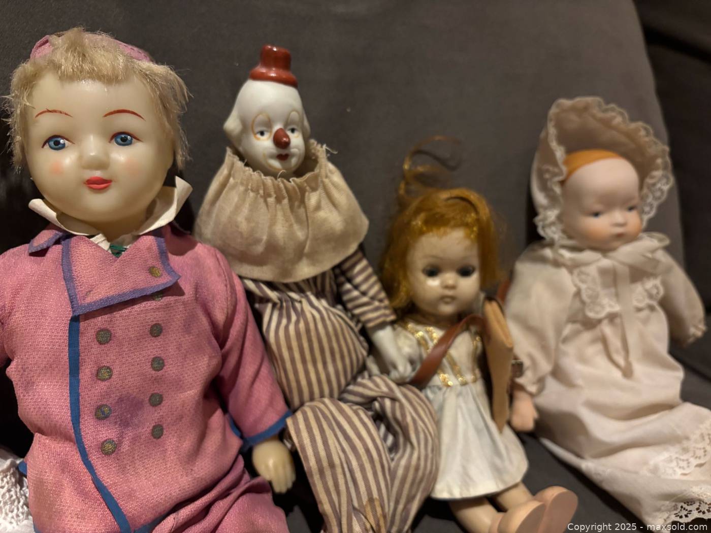 Assorted antique dolls with cradle and parasol | Maxsold