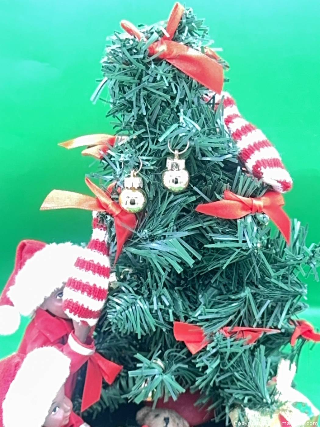 Enesco tabletop artificial Christmas tree with elves | Maxsold