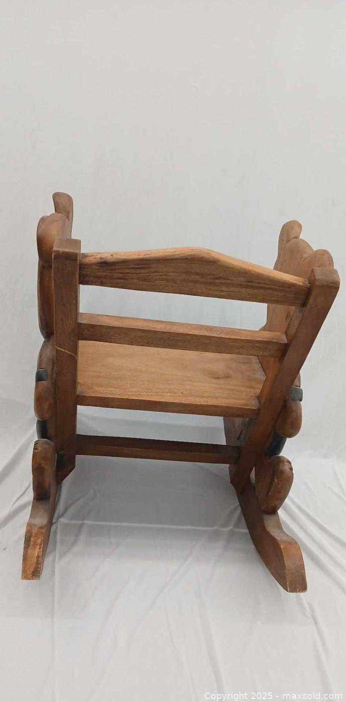 Mandalay Box Co. carved bear rocking chair | Maxsold