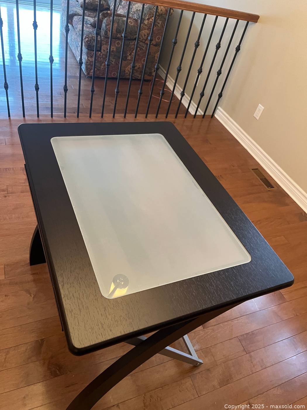 Black computer desk with glass insert | Maxsold