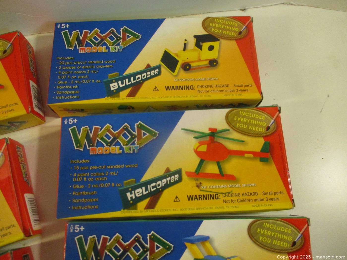 Eight boxed wood model kits | Maxsold