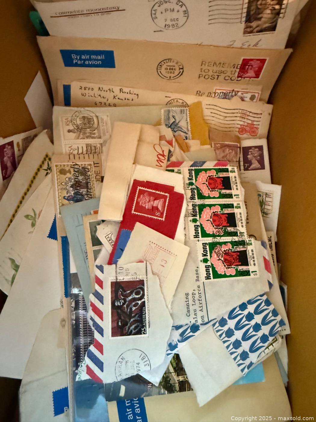 Box of assorted postage stamps | Maxsold
