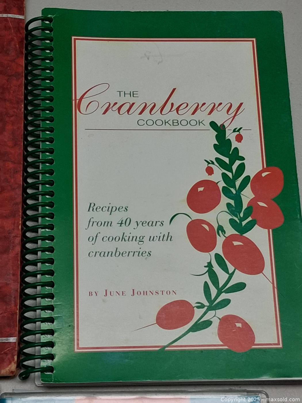 Two cookbooks plus two cooking DVDs | Maxsold