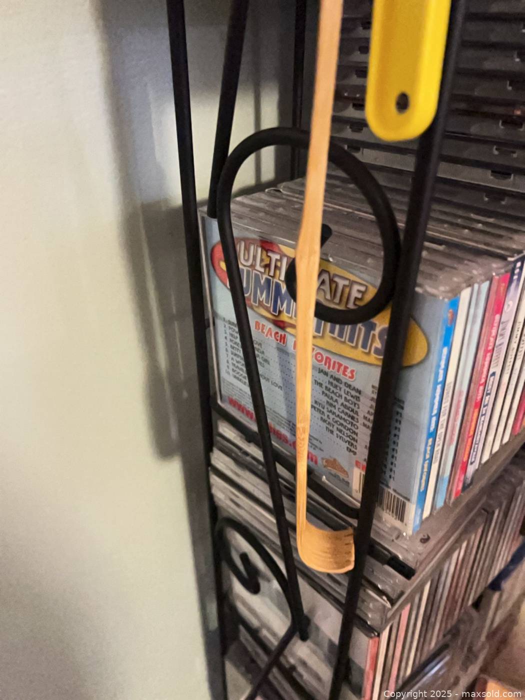 Pair of wrought iron style metal tower racks | Maxsold