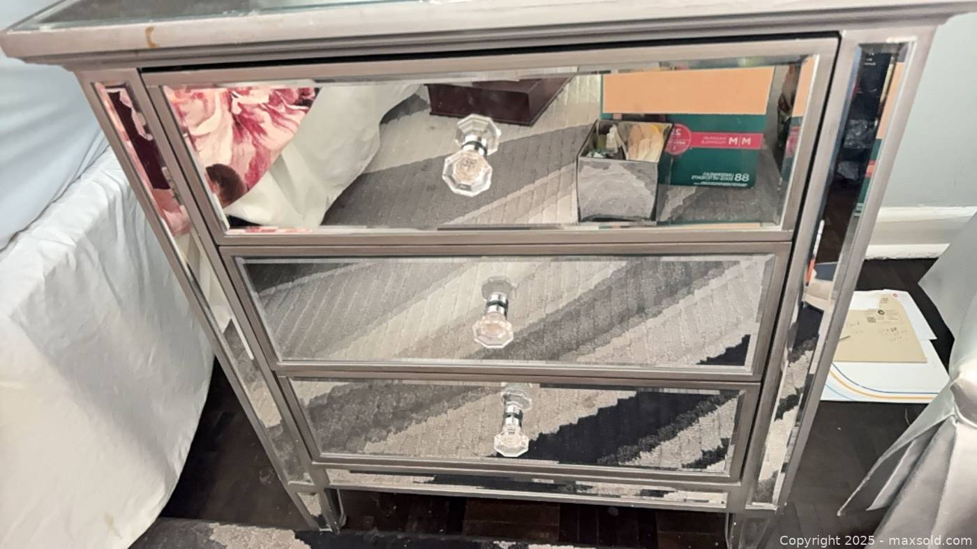Three drawer mirrored nightstand Maxsold