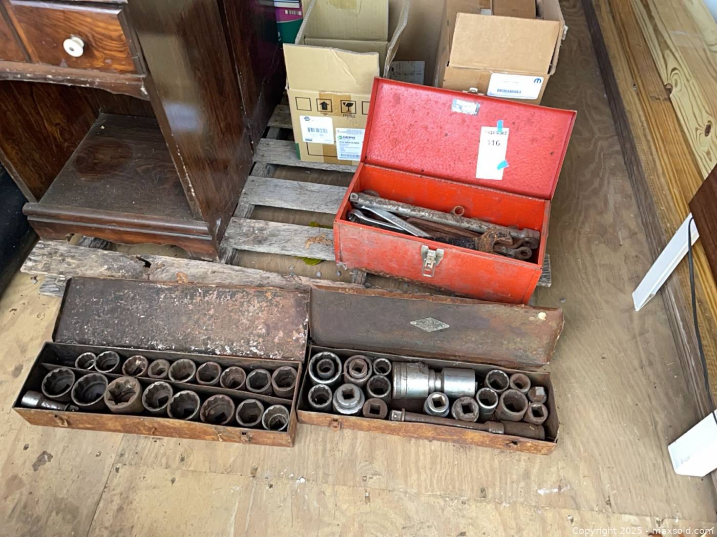 Large sockets and hand tools in three metal toolboxes | Maxsold