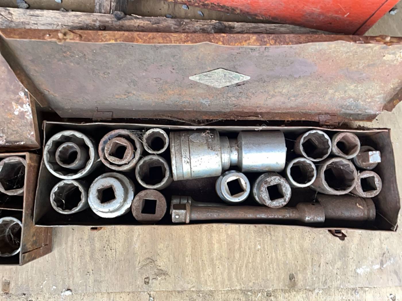 Large sockets and hand tools in three metal toolboxes | Maxsold