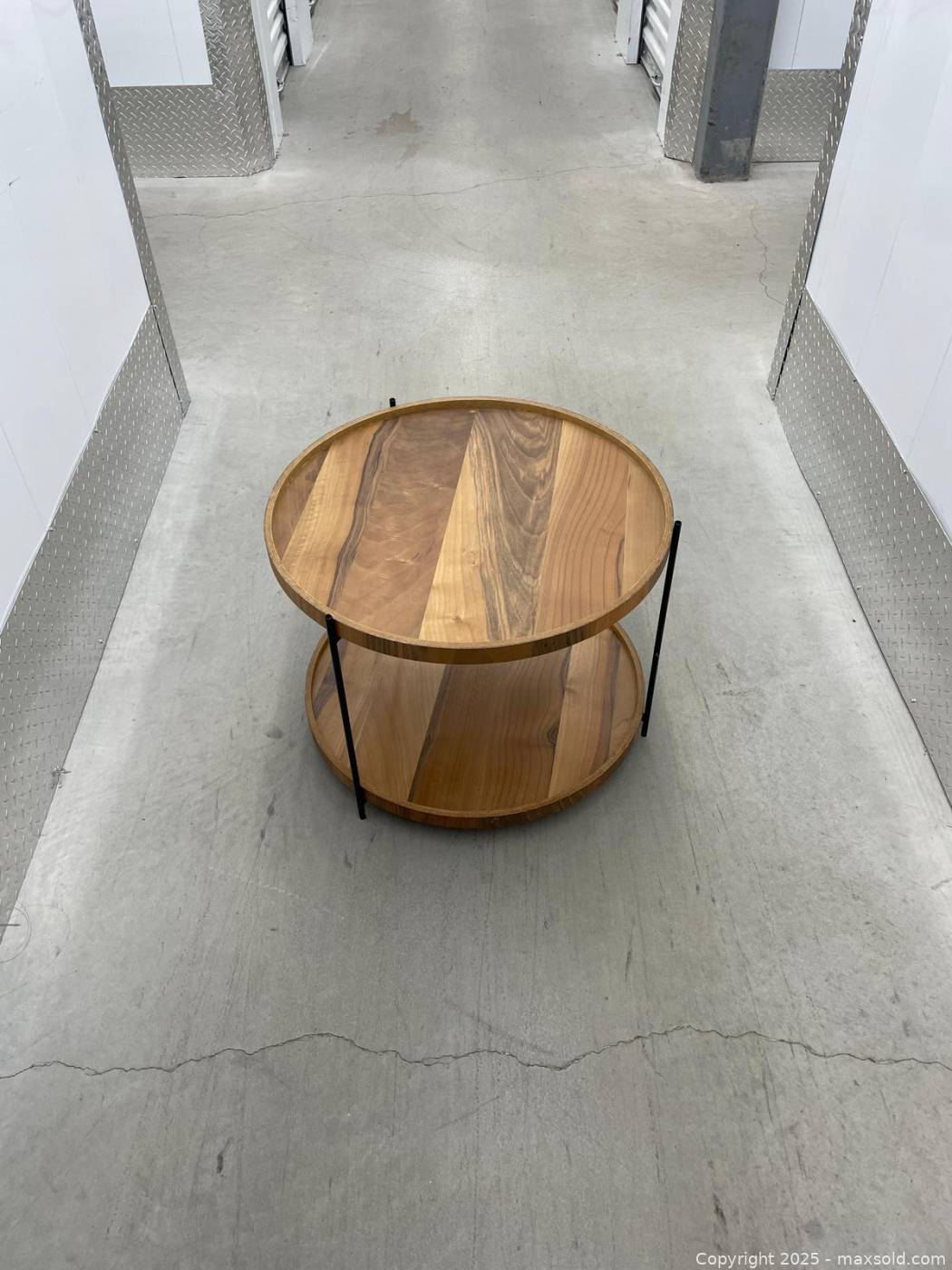 Round two-tier walnut coffee table | Maxsold