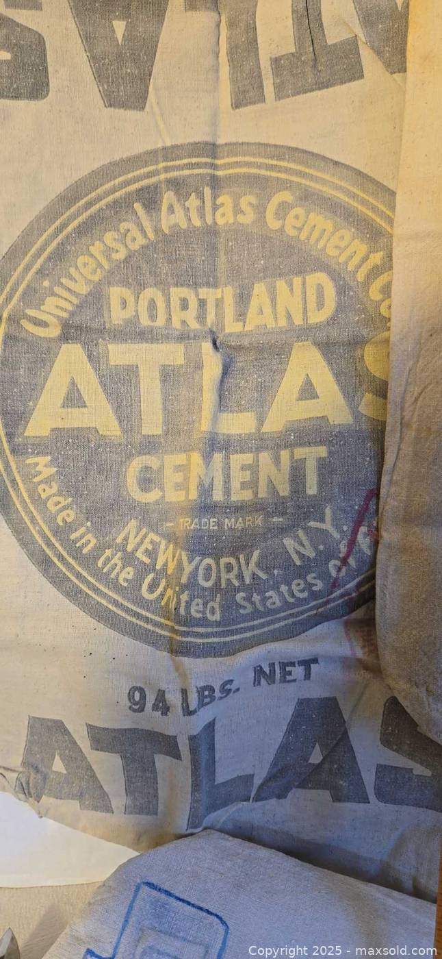 Vintage Atlas and Dragon cement sacks with knife | Maxsold