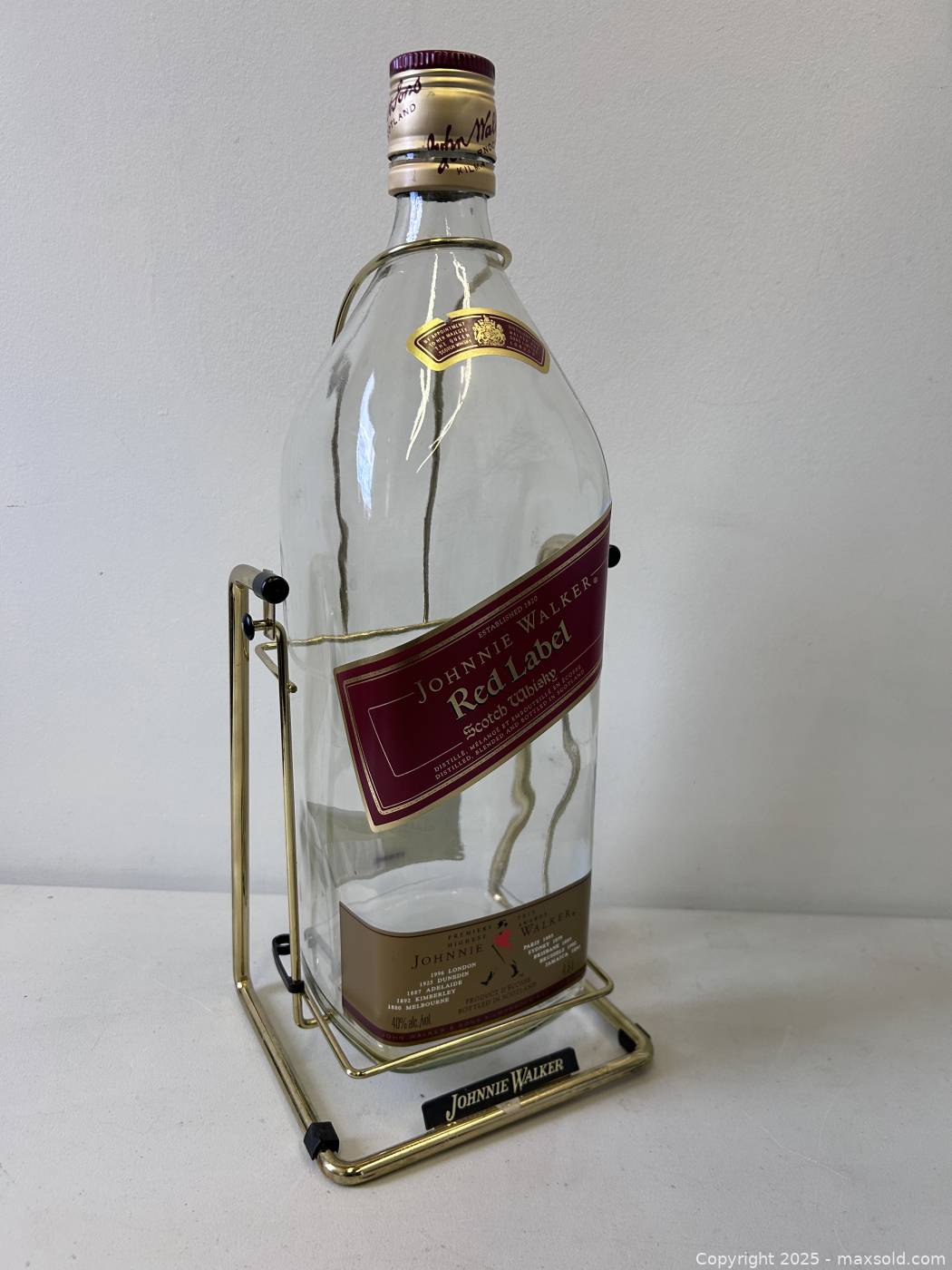 Red Albel Johnnie Walker Red Label 4.5-L bottle with gold swing stand | Maxsold