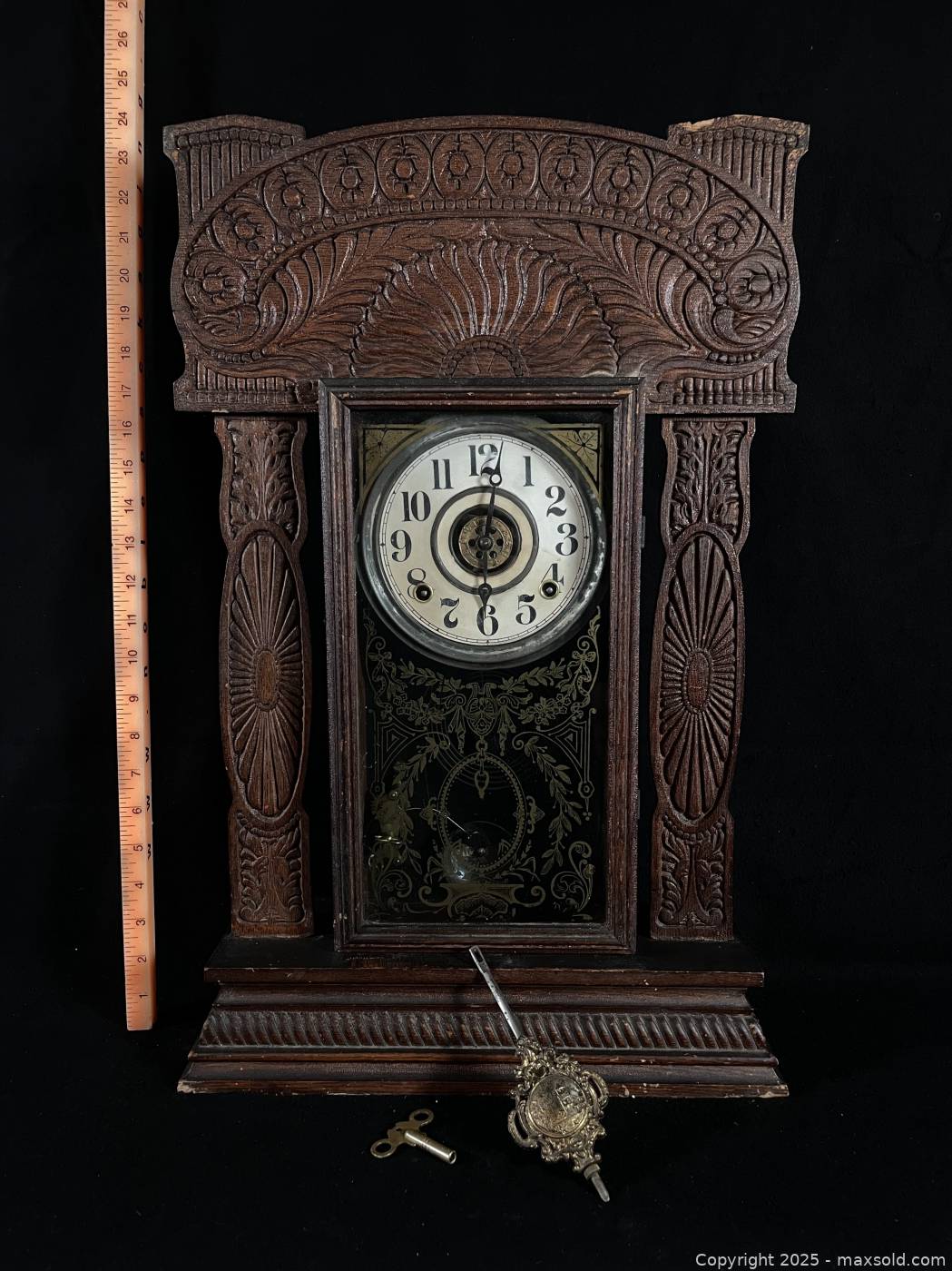 Antique carved wooden mantel clock with pendulum and key | Maxsold