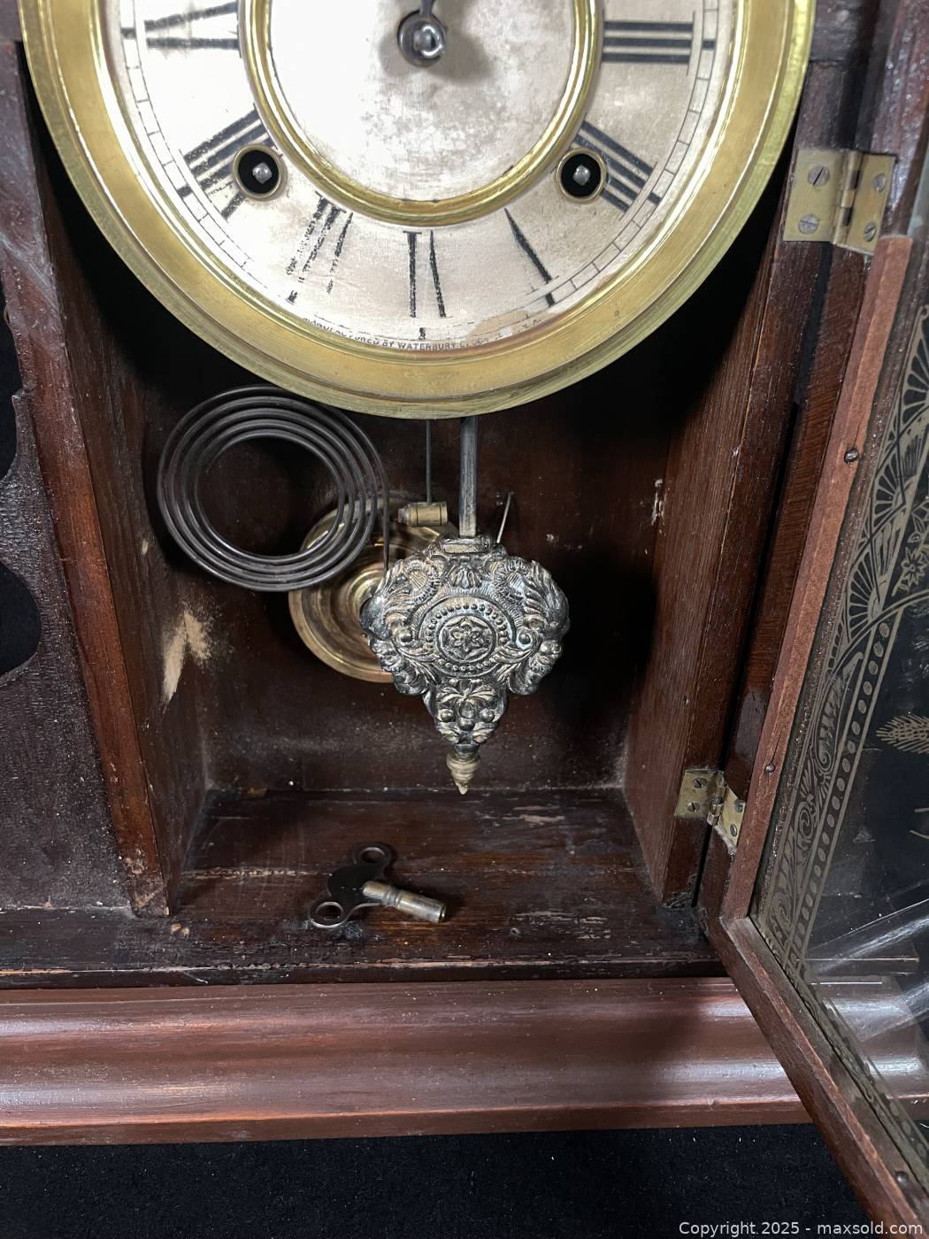 Antique carved wooden mantel clock with pendulum and key | Maxsold