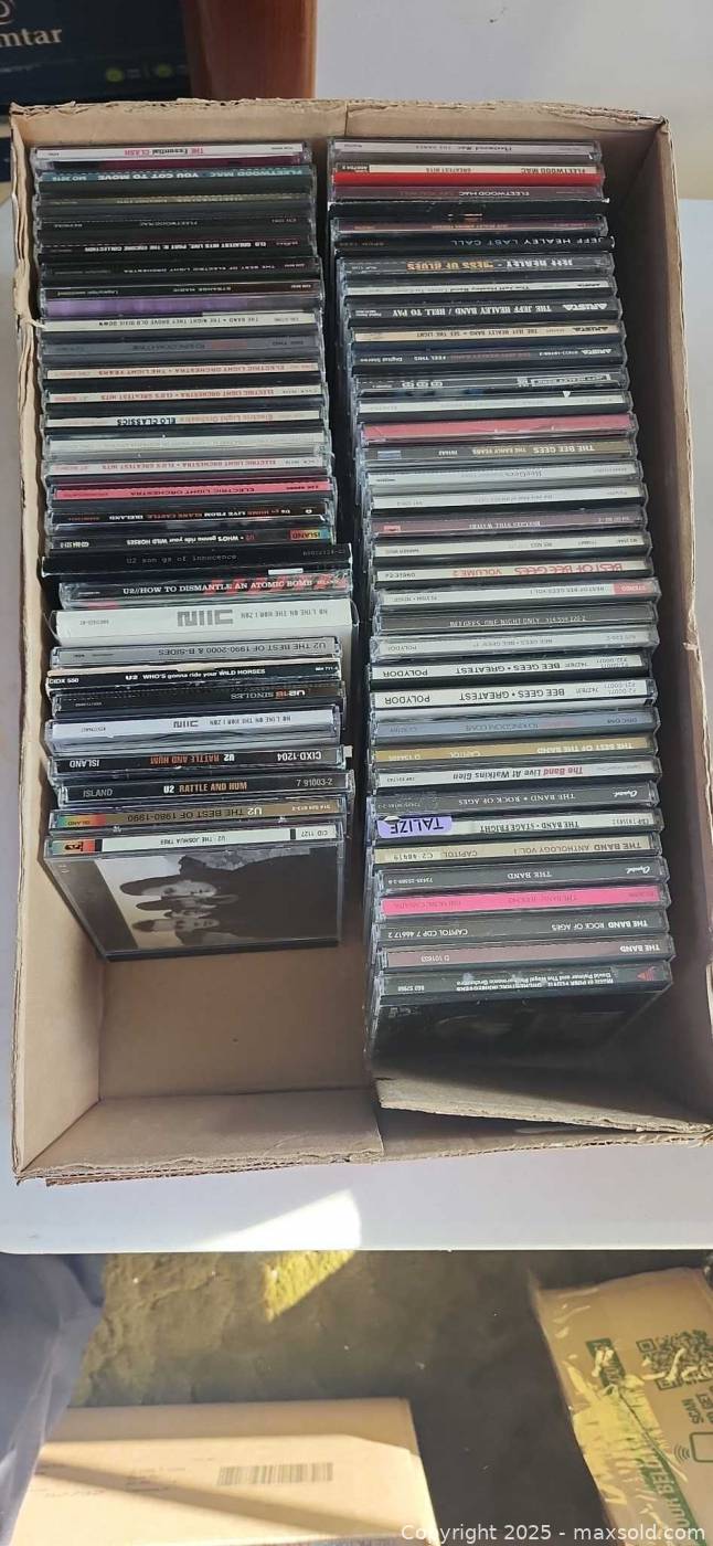 Five boxes of music CDs | Maxsold