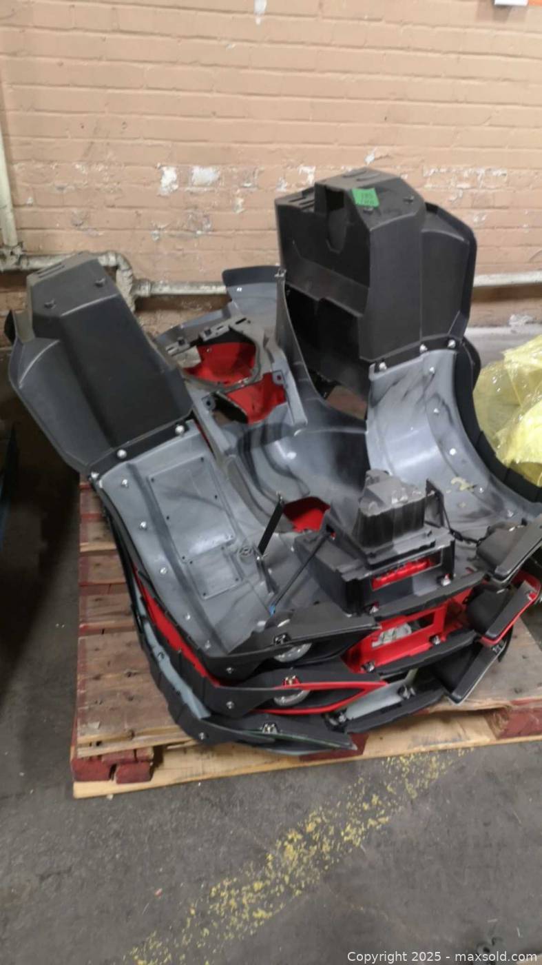 ATV body panels, seats, fork tubes on 3 pallets | Maxsold