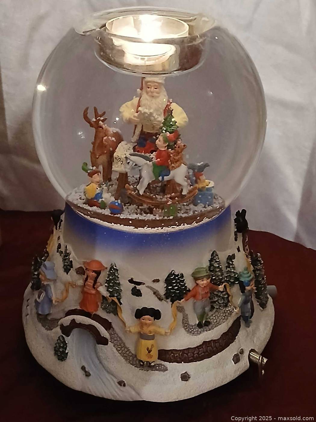 PartyLite Santa at His Shop tealight musical snow globe 2004 | Maxsold